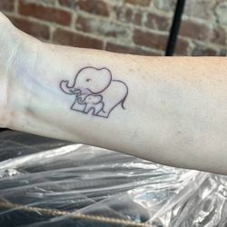 Divine Moment Tattooing