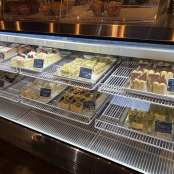 Milano Bean Cafe - a display case filled with cakes and pastries - Desserts Near Me - Bay Shore, New York Milano Bean Cafe - a display case filled with cakes and pastries - Desserts Near Me - Bay Shore, New York