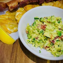 Cafe Latino - Chicharrón, Guacamole & Tostones

Crispy fried pork belly served with fresh house-made guacamole and golden fried plantains.
