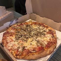 Thompson's Pizzeria - Regular crust pizza with Cheese and fresh mushrooms. :)