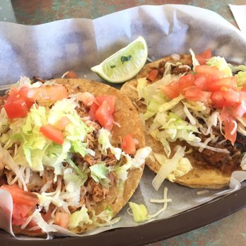 Mariachi's Tacos - One chicken and one ground beef taco topped with lettuce, tomato & cheese. I highly recommend the chicken over the ground beef. - Mexican Near Me - Des Plaines, Illinois