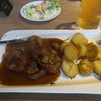 Die Hütte - Pork Snitzel with Hager sauce. - Italian Near Me - Wiesbaden, HE