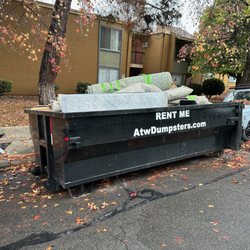 ATW Dumpster Rentals - Happy customer remodeling an apt complex