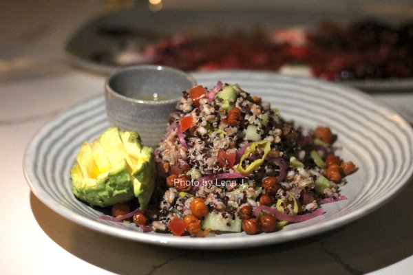 Photo of Sava's - Ann Arbor, MI, US. Mediterranean Bowl ($18) - farro and quinoa salad, tomato, cucumber, avocado, greek vinaigrette (requested on the side)