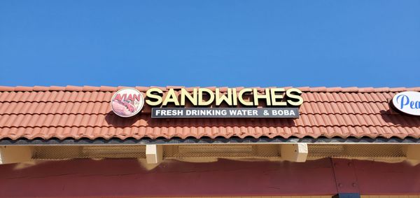 Avian Water and Banh Mi Sandwich by null