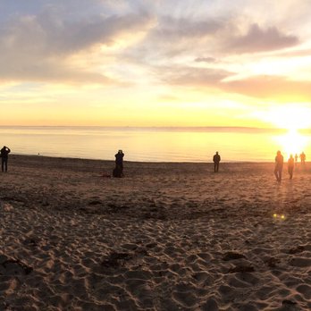 Herring Cove Beach - The crowds gathered to watch sunset on oyster fest weekend - Beaches Near Me