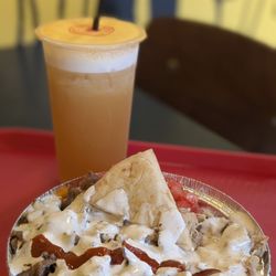 The Halal Guys - Small chicken and beef platter and mango drink