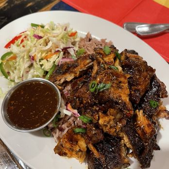 Topnotch Island Flavor Kitchen - Molasses rubbed jerk pork: $21.50 - Caribbean Near Me - Phoenix, Arizona