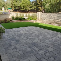 a patio with artificial grass