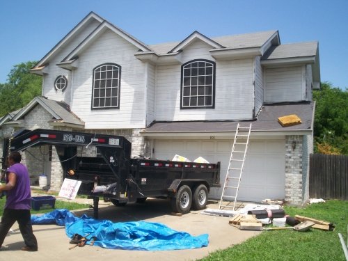 Slide of Astro Roofing