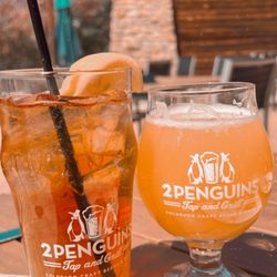 Whiskey Peach Iced Tea + Weldworks Maria Juana (pineapple express hazy ipa) on the patio in the sunshine