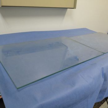 Micki Ly, MD - Dusty glass on exam table - Dermatologists Near Me - Kahului, Hawaii