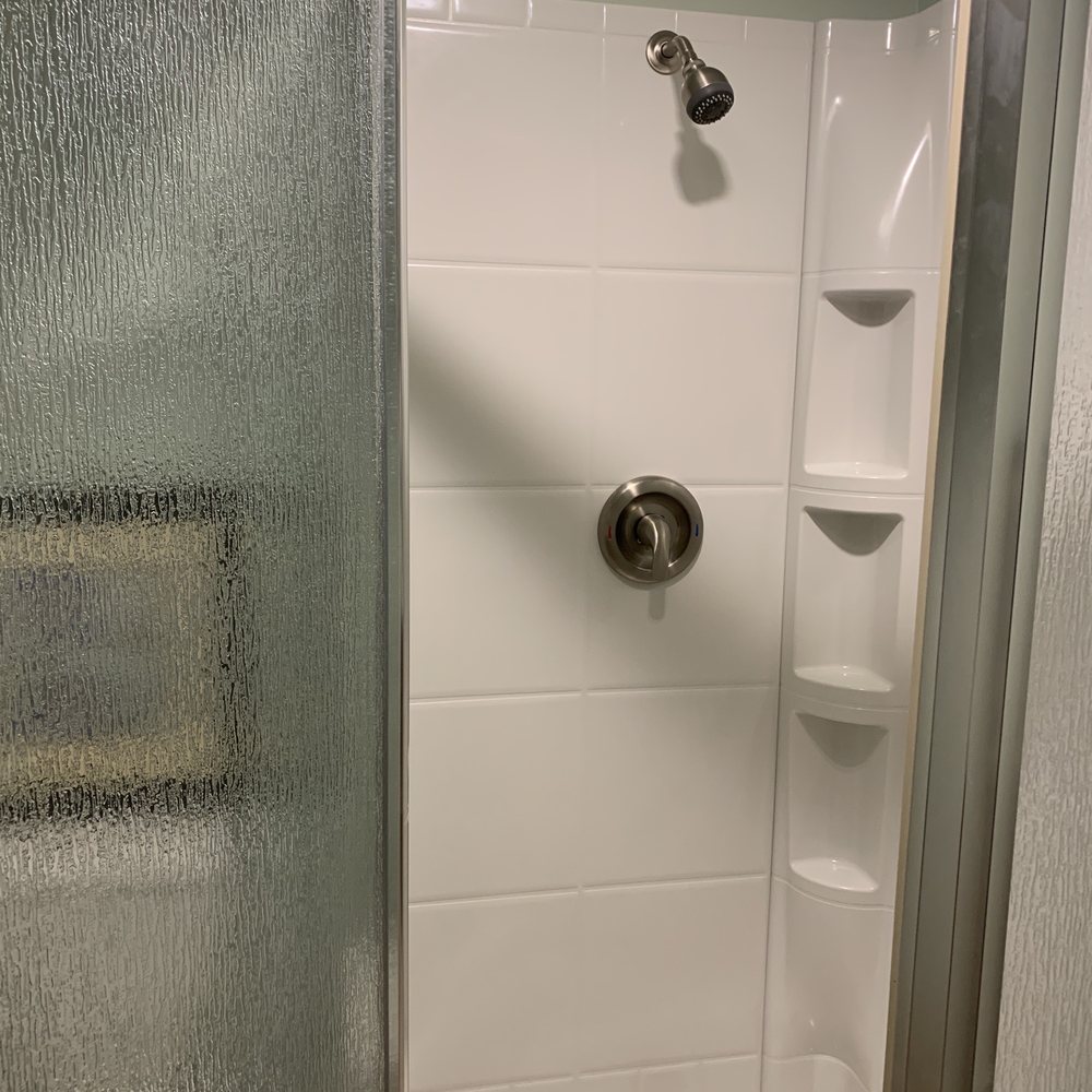 Trentham Construction and Remodeling - New fiberglass shower is great for freshening up after a workout in the home gym. - General Contractors Near Me - Mooresville, Indiana Trentham Construction and Remodeling - New fiberglass shower is great for freshening up after a workout in the home gym. - General Contractors Near Me - Mooresville, Indiana