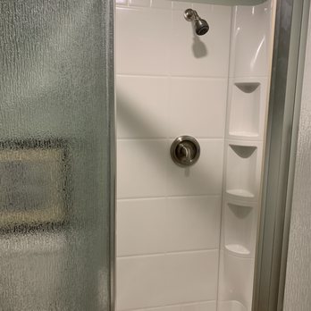 Trentham Construction and Remodeling - New fiberglass shower is great for freshening up after a workout in the home gym. - General Contractors Near Me - Mooresville, Indiana