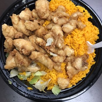 Caridad China - Fried chicken chunks(all white meat) with yellow rice. - Latin American Near Me - Brooklyn, New York