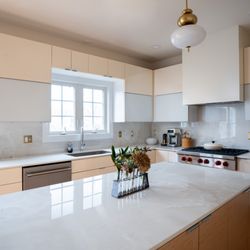 NV Kitchen & Bath - Stunning marble countertops for an elegant finish.