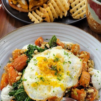 Aster - Top, burger with waffle fries. Bottom, sweet potatoe hash - Salad Near Me - Midland, Michigan