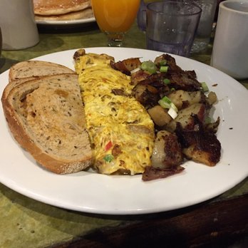 Bella's Cafe - Tuscan Omelet, potatoes, and rye bread. - Breakfast & Brunch Near Me - New Haven, Connecticut Bella's Cafe - Tuscan Omelet, potatoes, and rye bread. - Breakfast & Brunch Near Me - New Haven, Connecticut