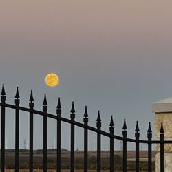 Royal Community & RV Park - Moonrise over the Royal and its (1 of 3 )wrought-iron entrances.