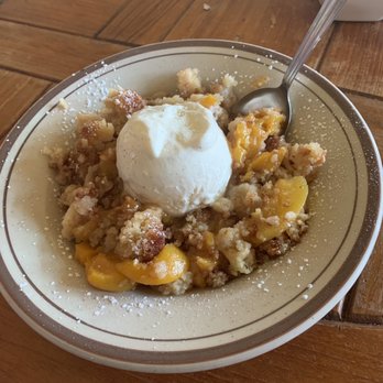 The Lake House - Peach cobbler with French vanilla ice cream - Seafood Near Me - Santee, South Carolina The Lake House - Peach cobbler with French vanilla ice cream - Seafood Near Me - Santee, South Carolina
