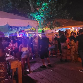 Cavanaugh's Riverdeck - a crowd of people standing under umbrellas - Dance Clubs Near Me - Philadelphia, Pennsylvania Cavanaugh's Riverdeck - a crowd of people standing under umbrellas - Dance Clubs Near Me - Philadelphia, Pennsylvania