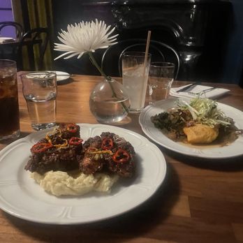 Restaurant Claudine - The Fried chicken on pomme dinner dish and The Snapper with Red Eye Sauce & Greens - French Near Me - San Antonio, Texas Restaurant Claudine - The Fried chicken on pomme dinner dish and The Snapper with Red Eye Sauce & Greens - French Near Me - San Antonio, Texas
