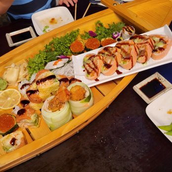 Akira - Sushi Boat: Cali Beach, bomb lobster, pink lady, eel avocado, ikura sashimi, white tuna....fantastic! - Japanese Near Me - Moorestown, New Jersey Akira - Sushi Boat: Cali Beach, bomb lobster, pink lady, eel avocado, ikura sashimi, white tuna....fantastic! - Japanese Near Me - Moorestown, New Jersey