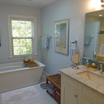 Gumtree Enterprises - a bathroom with a bathtub and a window - General Contractors Near Me - Charlottesville, Virginia Gumtree Enterprises - a bathroom with a bathtub and a window - General Contractors Near Me - Charlottesville, Virginia