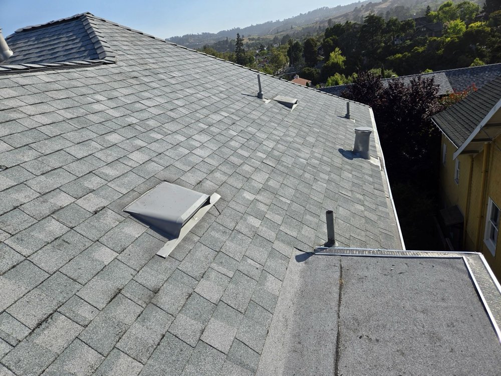 Slide of Astro Roofing