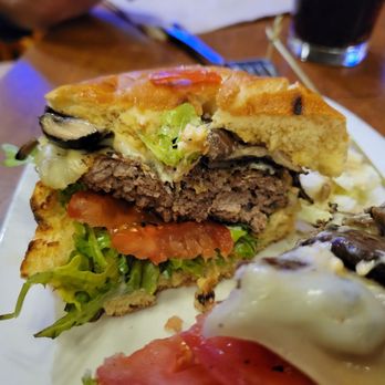 White Spot - a half eaten sandwich on a plate - Canadian (New) Near Me - Squamish, British Columbia White Spot - a half eaten sandwich on a plate - Canadian (New) Near Me - Squamish, British Columbia