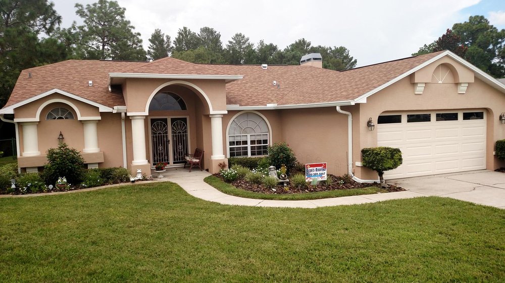 Slide of Alan's Roofing