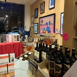 Blue Dog Wine & Spirits - Some of the blue dog paintings
