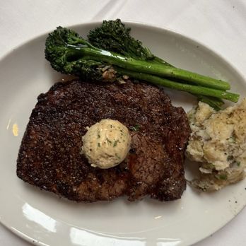 Del Frisco's Double Eagle Steakhouse - Prime Ribeye 16 oz , Chateau Mashed Potatoes and Roasted Broccolini - Steakhouses Near Me - Charlotte, North Carolina