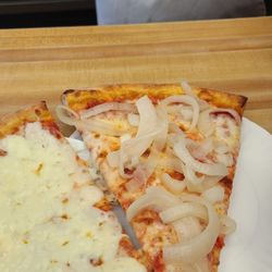 One with extra cheese. One with onions. Good.