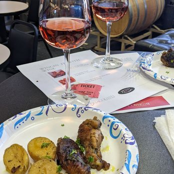 Bonacquisti Wine Company - two glasses of wine and a plate of food - Wineries Near Me - Denver, Colorado