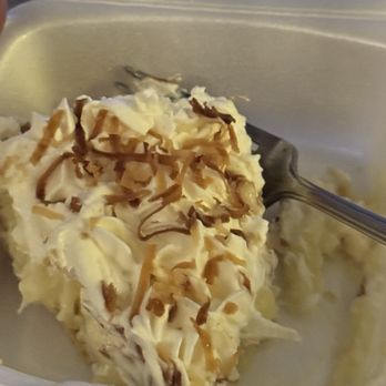 Buttered Bunns Cafe - Coconut cream pie that I took home to eat later. Half the slice gone before I thought to take a picture! - American Near Me - Miami, Oklahoma Buttered Bunns Cafe - Coconut cream pie that I took home to eat later. Half the slice gone before I thought to take a picture! - American Near Me - Miami, Oklahoma