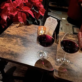 The Wine Room - two glasses of wine on a table - Wine Bars Near Me - Palo Alto, California The Wine Room - two glasses of wine on a table - Wine Bars Near Me - Palo Alto, California