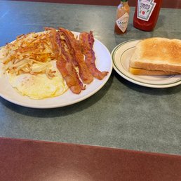Fried eggs, hash browns and bacon. Very good. Fried eggs, hash browns and bacon. Very good.