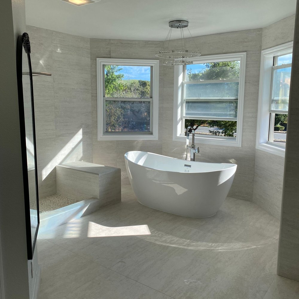 Porcelanosa - a bathtub in a bathroom - Flooring Near Me - Walnut Creek, California