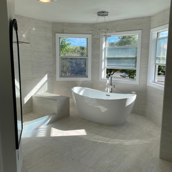 Porcelanosa - a bathtub in a bathroom - Flooring Near Me - Walnut Creek, California Porcelanosa - a bathtub in a bathroom - Flooring Near Me - Walnut Creek, California