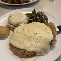 Flat Creek - Country fried steak, mashed potatoes and gravy, and green beans with a garlic roll