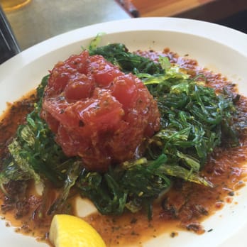 Fisherman's Market - Fresh ahi tuna over seaweed salad - Seafood Near Me - Eugene, Oregon Fisherman's Market - Fresh ahi tuna over seaweed salad - Seafood Near Me - Eugene, Oregon