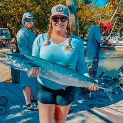 Captain Michael Partyboat Fishing - Looks like this mermaid got herself a nice catch! 