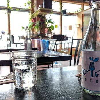 Nourish Bistro - Interesting bottle - Vegan Near Me - Banff, Alberta Nourish Bistro - Interesting bottle - Vegan Near Me - Banff, Alberta