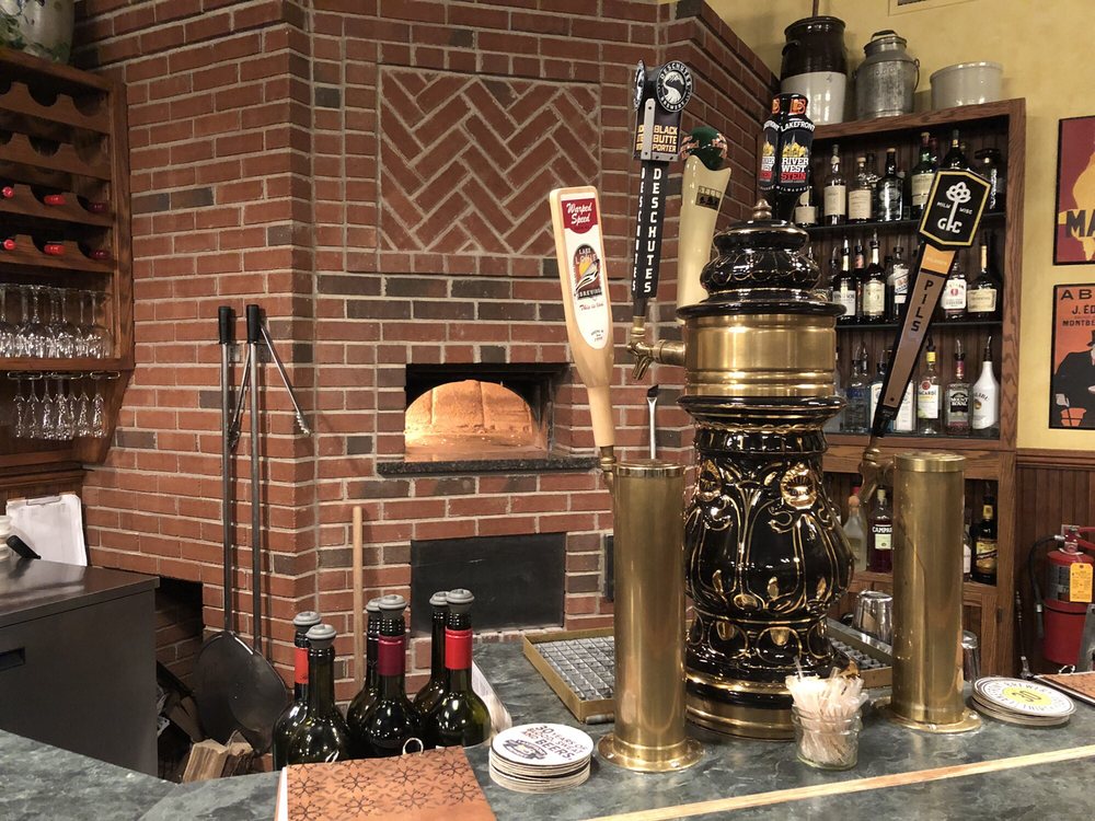 Village Hearthstone Restaurant Logo