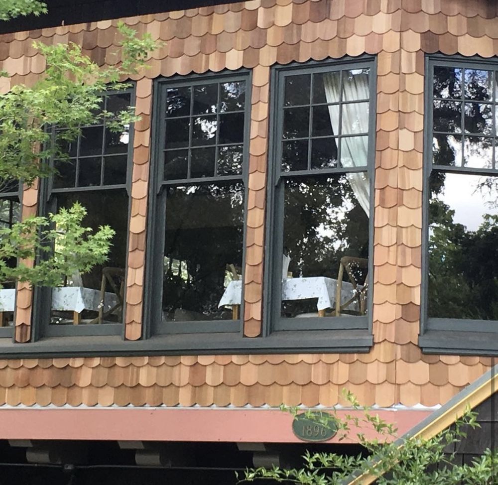 Slide of Exclusively Roofing