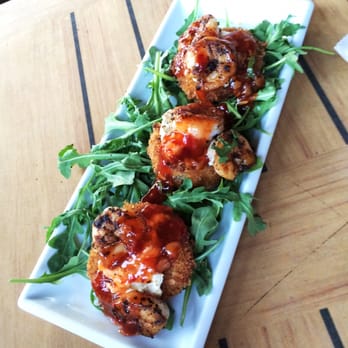 Dead Dog Saloon - Fried green tomatoes with shrimp over it. Lil spicy and definitely different! Enjoyed these.. - Seafood Near Me - Murrells Inlet, South Carolina