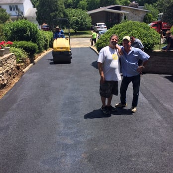 Paveco Asphalt Services - two men standing in the middle of the road - General Contractors Near Me - Langhorne, Pennsylvania Paveco Asphalt Services - two men standing in the middle of the road - General Contractors Near Me - Langhorne, Pennsylvania