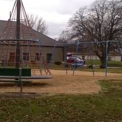Spinning and swinging equipment at the playground