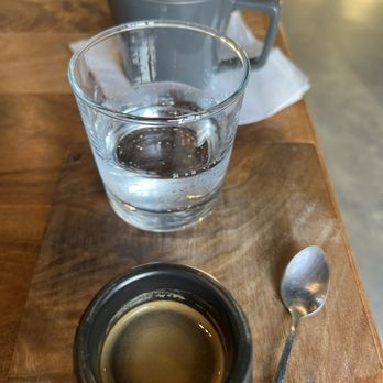 Native Coffee - An espresso with a competition drip in the background - Coffee & Tea Near Me - Dallas, Texas